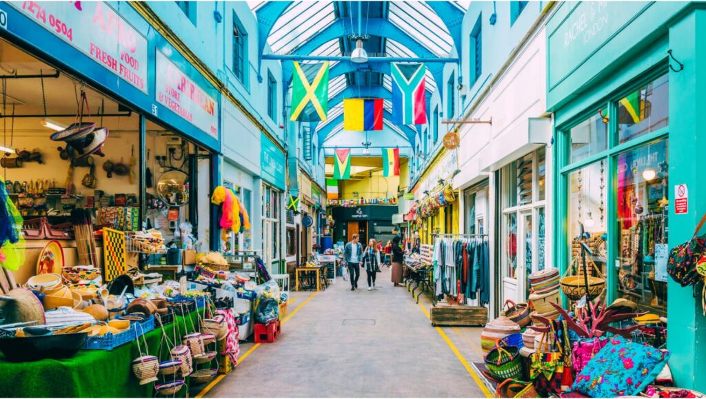 Stalls at Brixton Market with fresh produce and handmade goods.