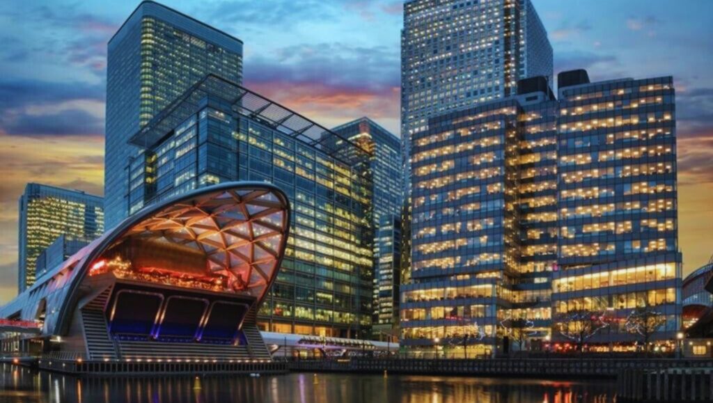 Canary Wharf skyline showcasing modern high-rise buildings and vibrant energy.