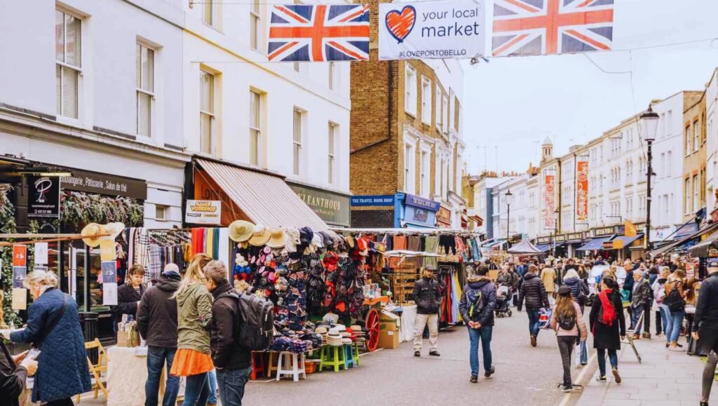 Bustling stalls at Portobello Road Market in Notting Hill.