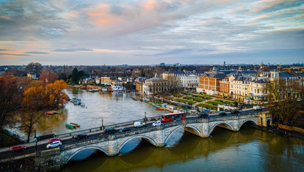 A picturesque view of Richmond along the River Thames highlighting its natural beauty and suburban charm.