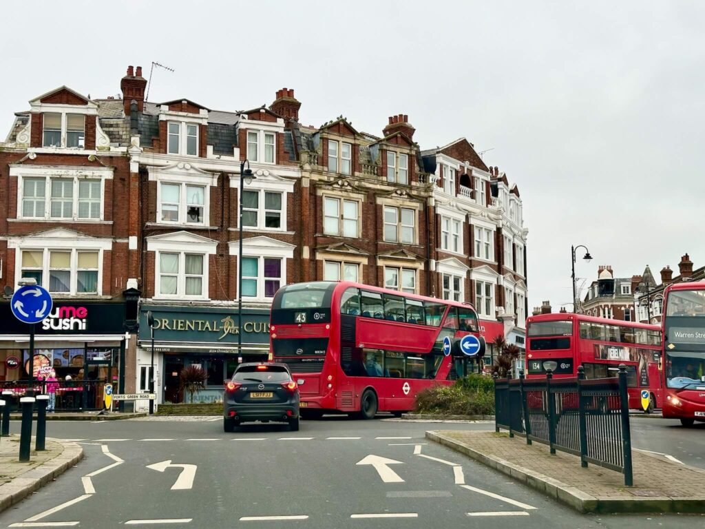 Muswell Hill high street with vibrant independent shops, cafes, and restaurants.