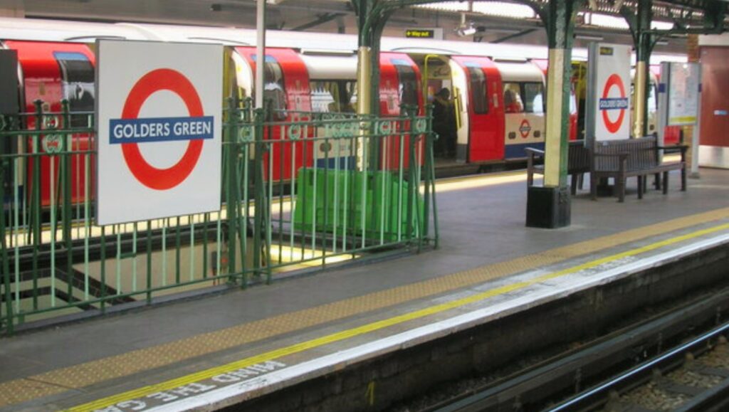 Busy Golders Green high street showing shops restaurants and Northern Line station demonstrating high tenant demand for North London lettings